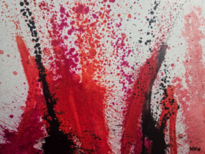 An expressive abstract artwork on cardboard with bold, energetic splatters and upward strokes of deep red, bright magenta, and stark black ink over an off-white background, signed MMW in the lower right corner.